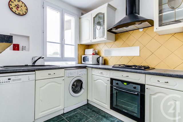 Afficher la photo en grand Appartement F2 à vendre - 2 pièces - 40.0 m2 - PARIS - 75017 - ILE-DE-FRANCE - Century 21 Patrimoine 17